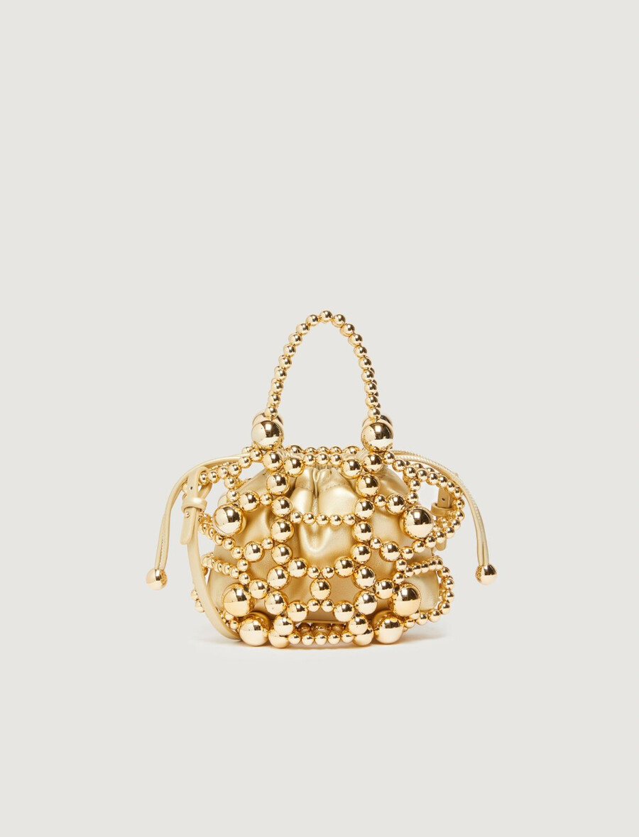 kleine beuteltasche mit kugeldetail – gold