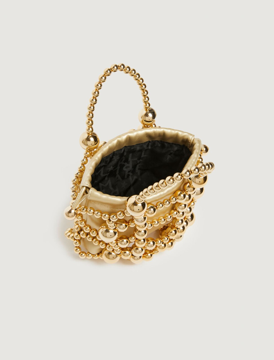 kleine beuteltasche mit kugeldetail – gold